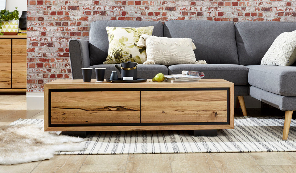 Eden coffee table in sustainable Australian messmate timber with unique knots, sleek modern edges, and black detailing