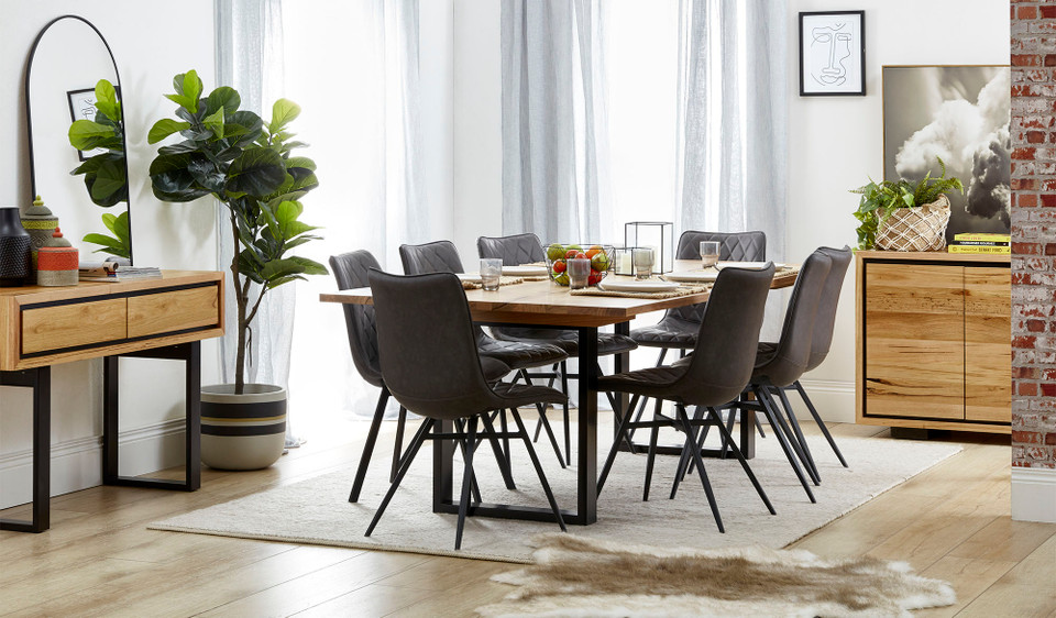 Eden dining table in sustainable Australian messmate timber with sleek modern edges and black detailing, contemporary timber dining table