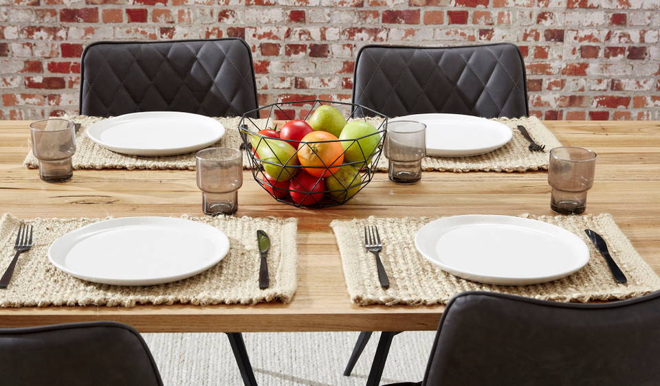 Eden dining table in sustainable Australian messmate timber with sleek modern edges and black detailing, contemporary timber dining table