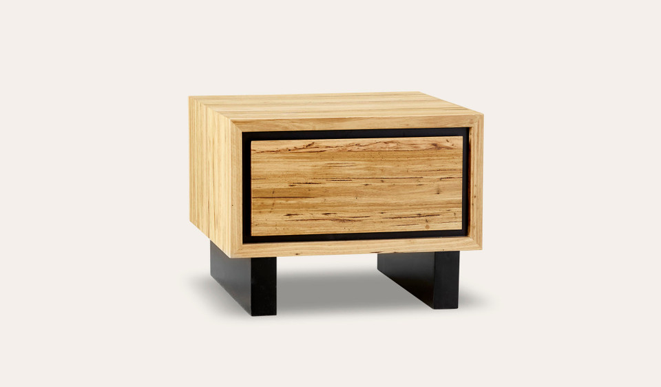 Eden lamp table in sustainable Australian messmate timber with sleek modern edges and black detailing, contemporary timber side table