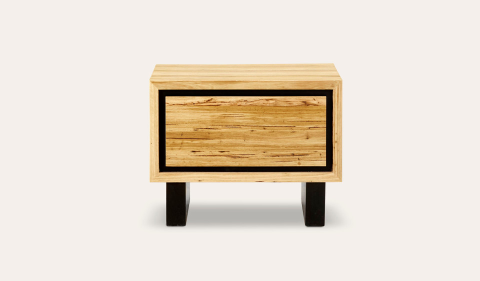Eden lamp table in sustainable Australian messmate timber with sleek modern edges and black detailing, contemporary timber side table