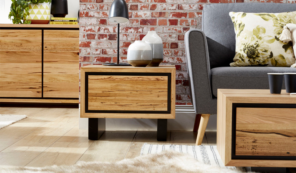 Eden lamp table in sustainable Australian messmate timber with sleek modern edges and black detailing, contemporary timber side table