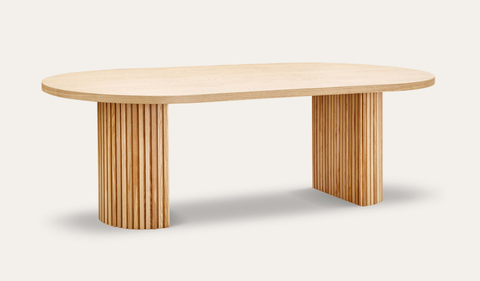 Eclipse natural ash dining table with distinct sculptural base and modern design, creating a sophisticated and timeless statement for the dining room