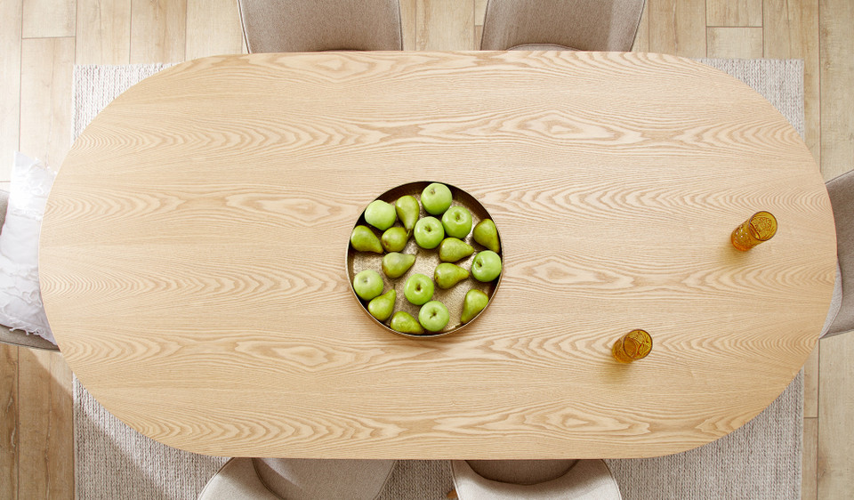 Eclipse natural ash dining table with distinct sculptural base and modern design, creating a sophisticated and timeless statement for the dining room