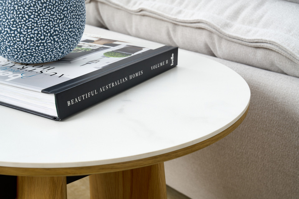 Cara lamp table with matte white carrara-look ceramic top and natural oak finish, modern round side table