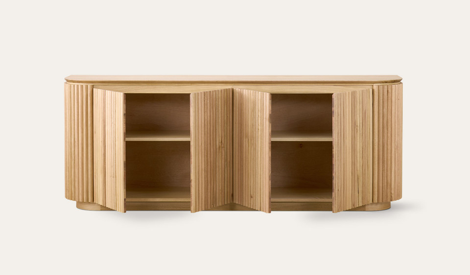 Carrera buffet in Tasmanian oak timber with fluted detailing, curved silhouette, and natural water-based finish, modern timber buffet cabinet
