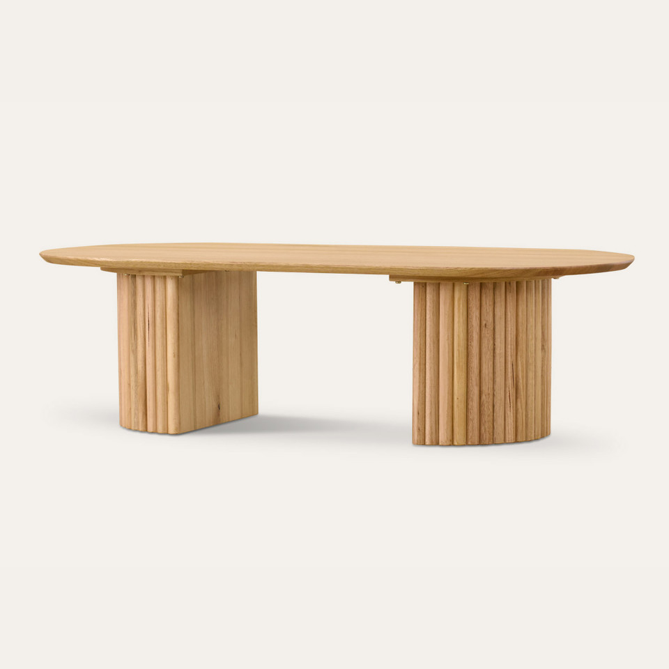 Carrera coffee table in Tasmanian oak timber with fluted detailing, curved silhouette, and natural water-based finish, modern timber coffee table