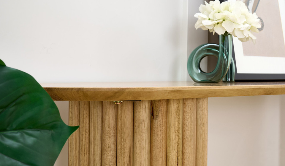 Carrera hall table in Tasmanian oak timber with fluted detailing, curved silhouette, and natural water-based finish, modern timber console table