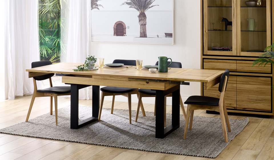 Eden extension dining table in sustainable Australian messmate timber with sleek modern edges, black detailing, and extendable design, contemporary timber dining table