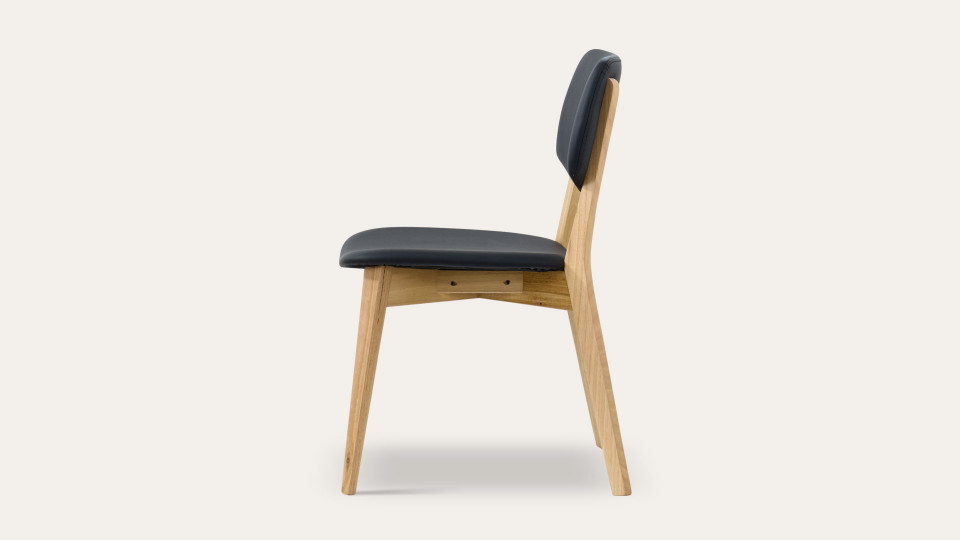 Eden dining chair in sustainable Australian messmate timber with black PU seat and back, modern timber dining chair