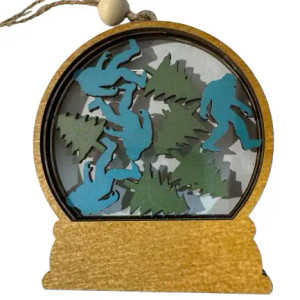 Bigfoot & Pines Snow Globe Ornament Bigfoot & Pines Snow Globe Ornament