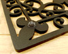 square metal trivet