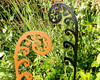 Fiddlehead fern metal garden stake black, copper in garden