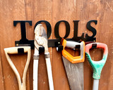 metal tools rack with garden items