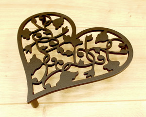 black metal heart-shaped trivet black metal heart-shaped trivet