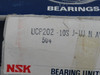 NSK UCP202-10S Pillow Block Ball Bearing 5/8" B x 1-3/16" BTC *DAMAGED BOX* NEW
