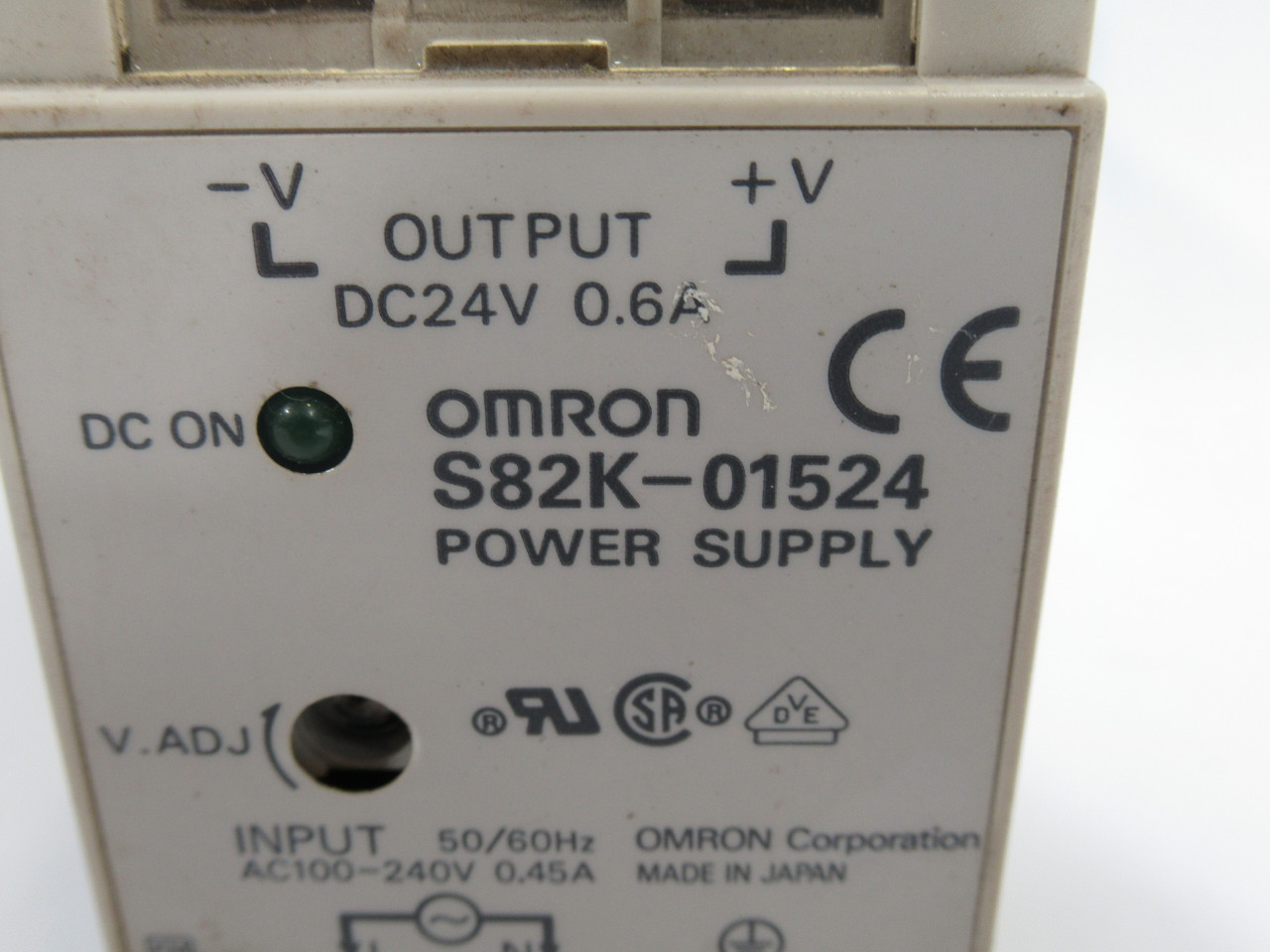 Omron S82K-01524 Power Supply 24VDC .6A *Adj Button Top Missing* USED