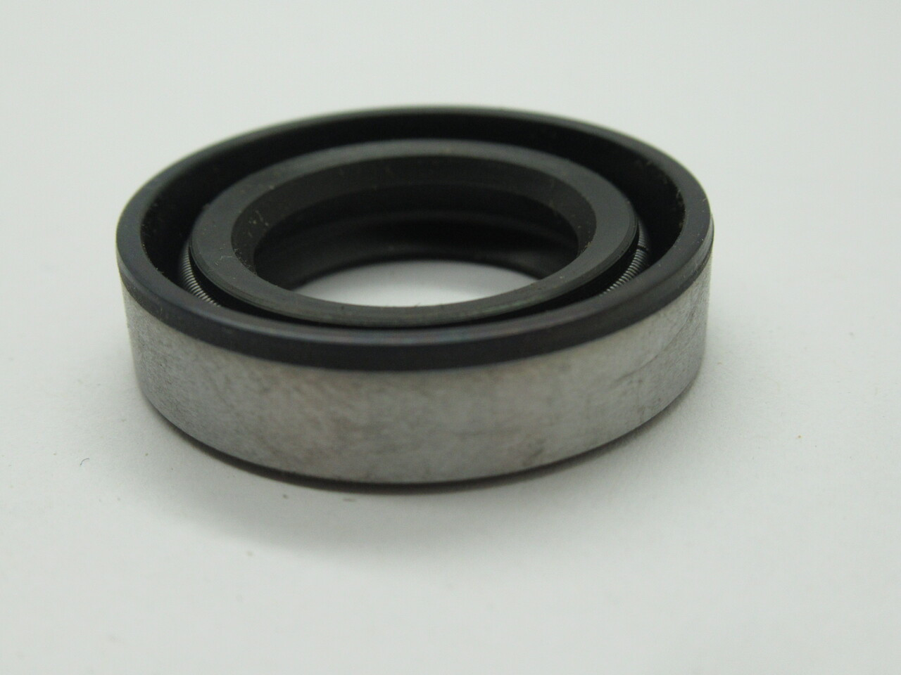 TCM 07123TZ Oil Seal Double Lip Spring Rubber 3/4" ID 1-1/4" OD 5/16" Width NEW