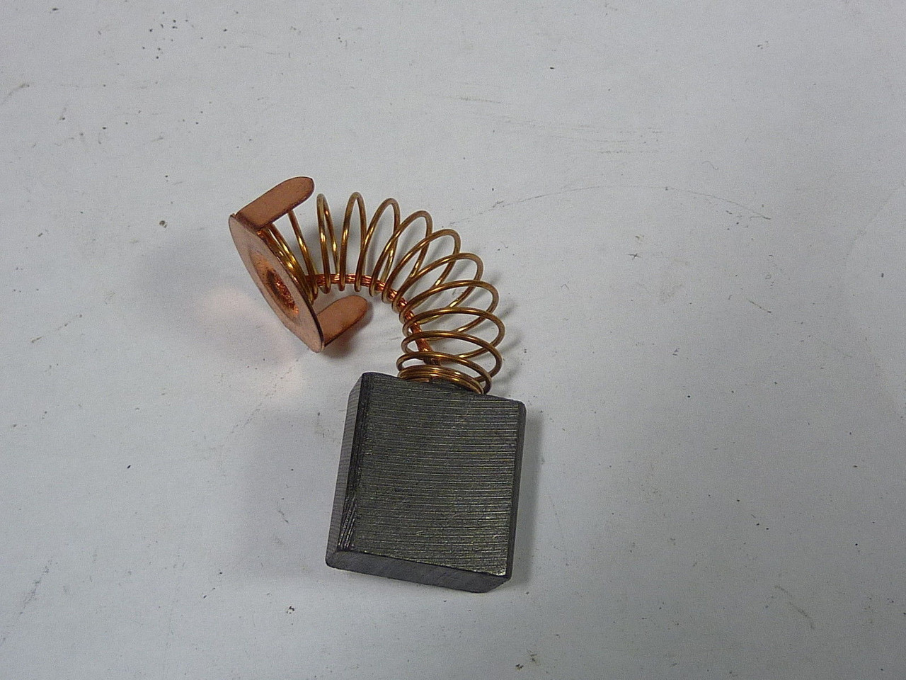 Generic H633 Motor Brush With Spring 19x9x20x20mm USED