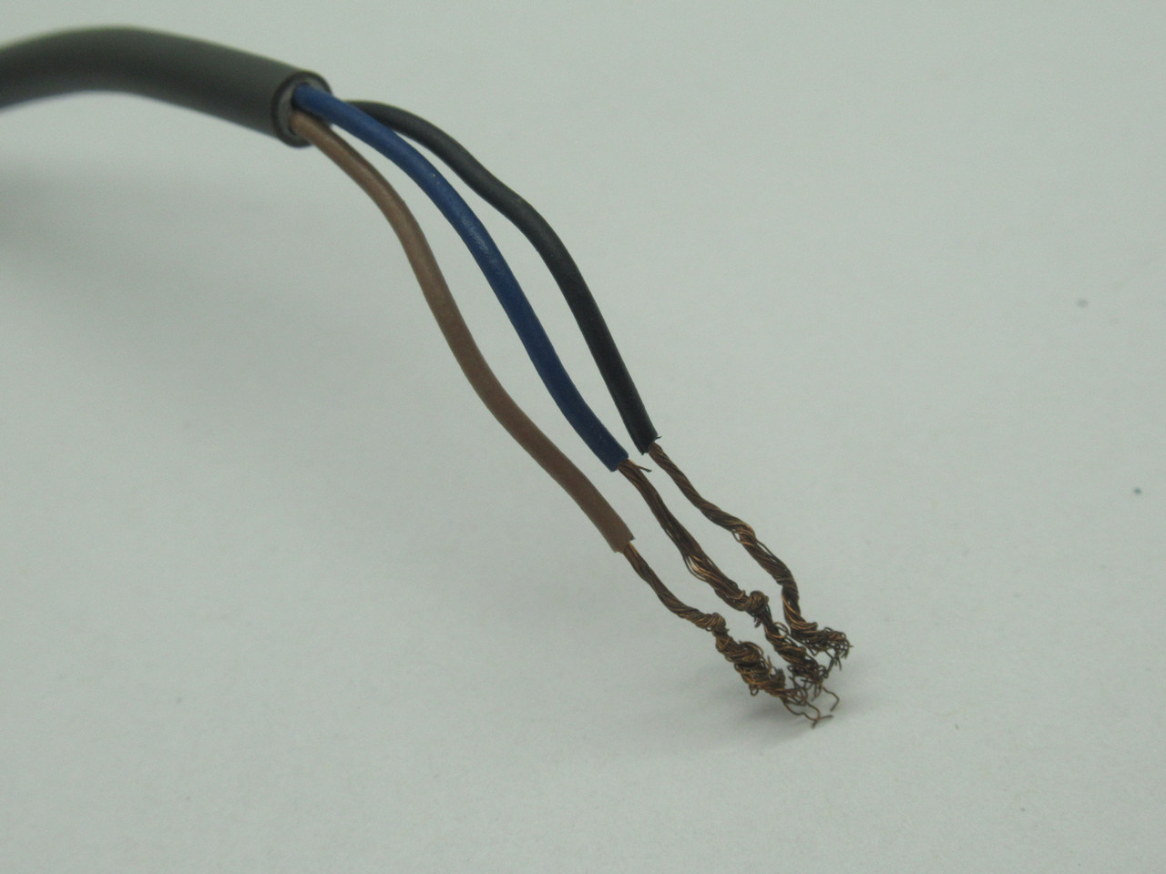 Omron TL-W5MB1 Flat Proximity Sensor 5mm Range PNP-NO 10mA 2m Length USED