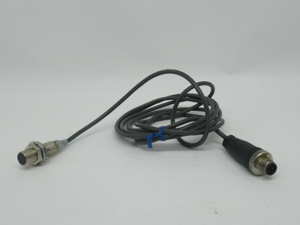 Omron E2A-M12KS04-WP-B1 Inductive Proximity Sensor 4mm Range PNP-NO 2m L USED