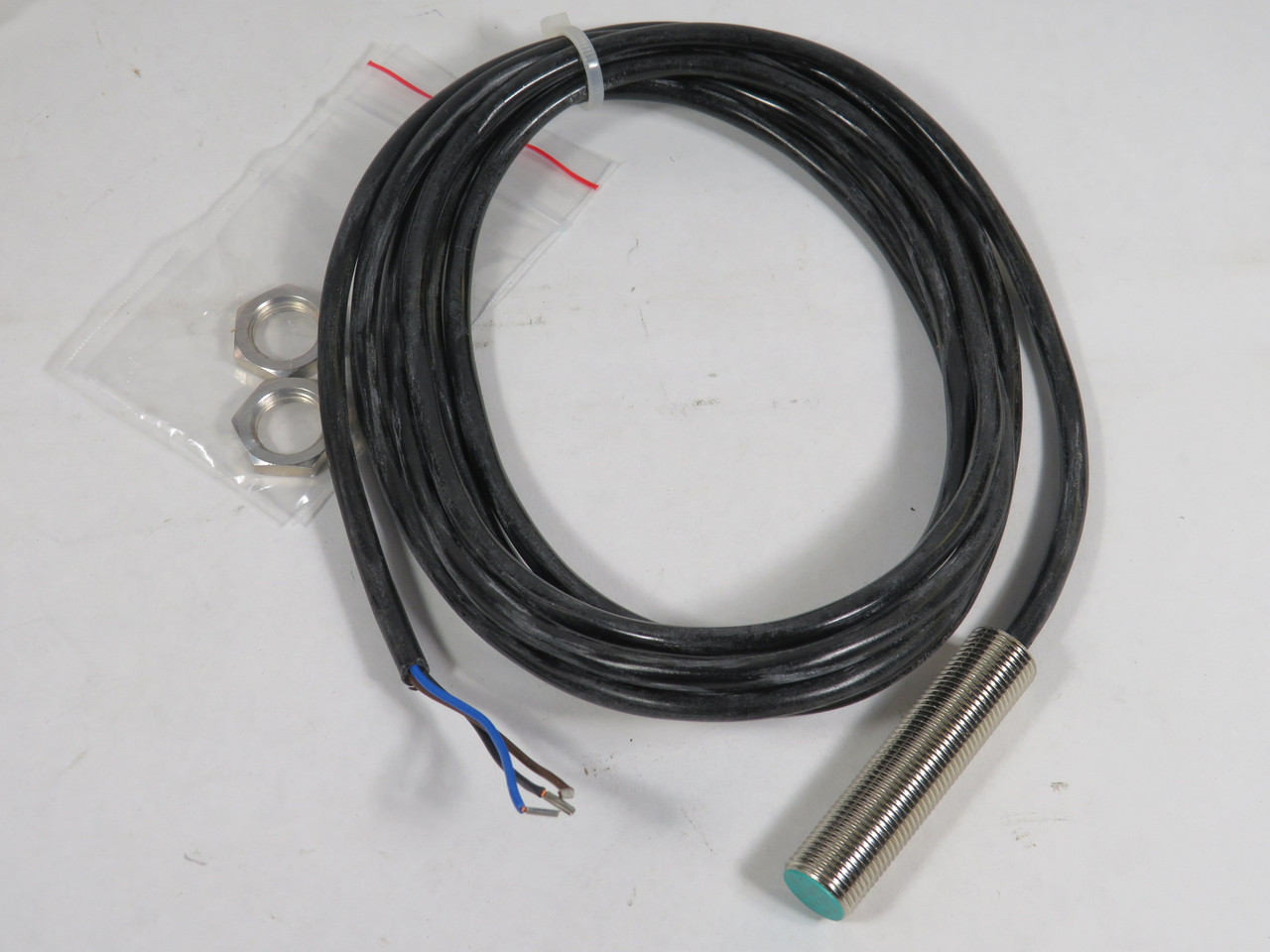 Pepperl+Fuchs 552591 Inductive Sensor 15-34VDC 2mm PUR 2m M12 *Holey Bag* NWB