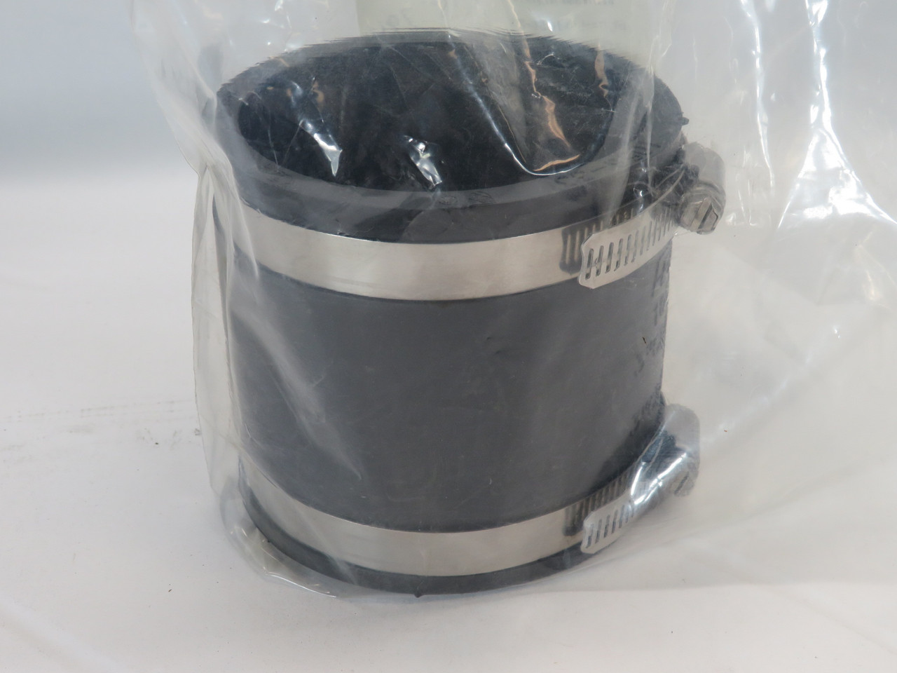 Fernco 1056-33 Flexible PVC Pipe Coupling 3.46"ID 4" Height WRITING ON LABEL NWB