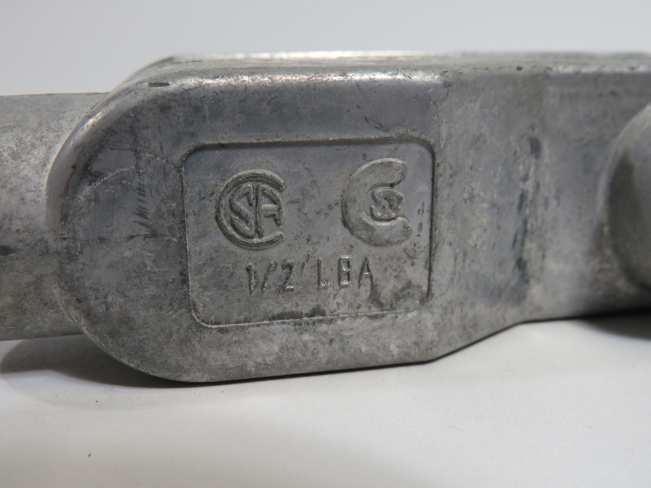 Generic LBA-1/2 Unthreaded Conduit Body 1/2" LBA w/ Cover USED