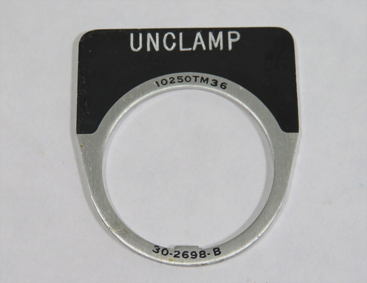 Cutler-Hammer 10250TM36STAMP Push Button Legend Plate UNCLAMP 30-2698-B USED