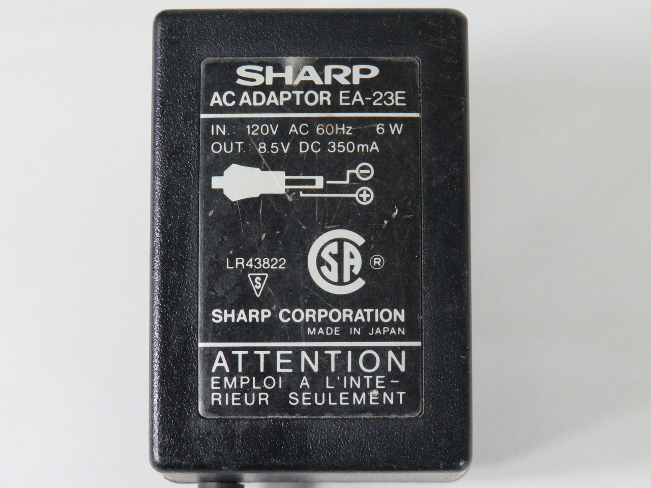 Sharp EA-23E AC Adapter Input: 120V 60Hz 6W Output: 8.5VDC 350mA USED