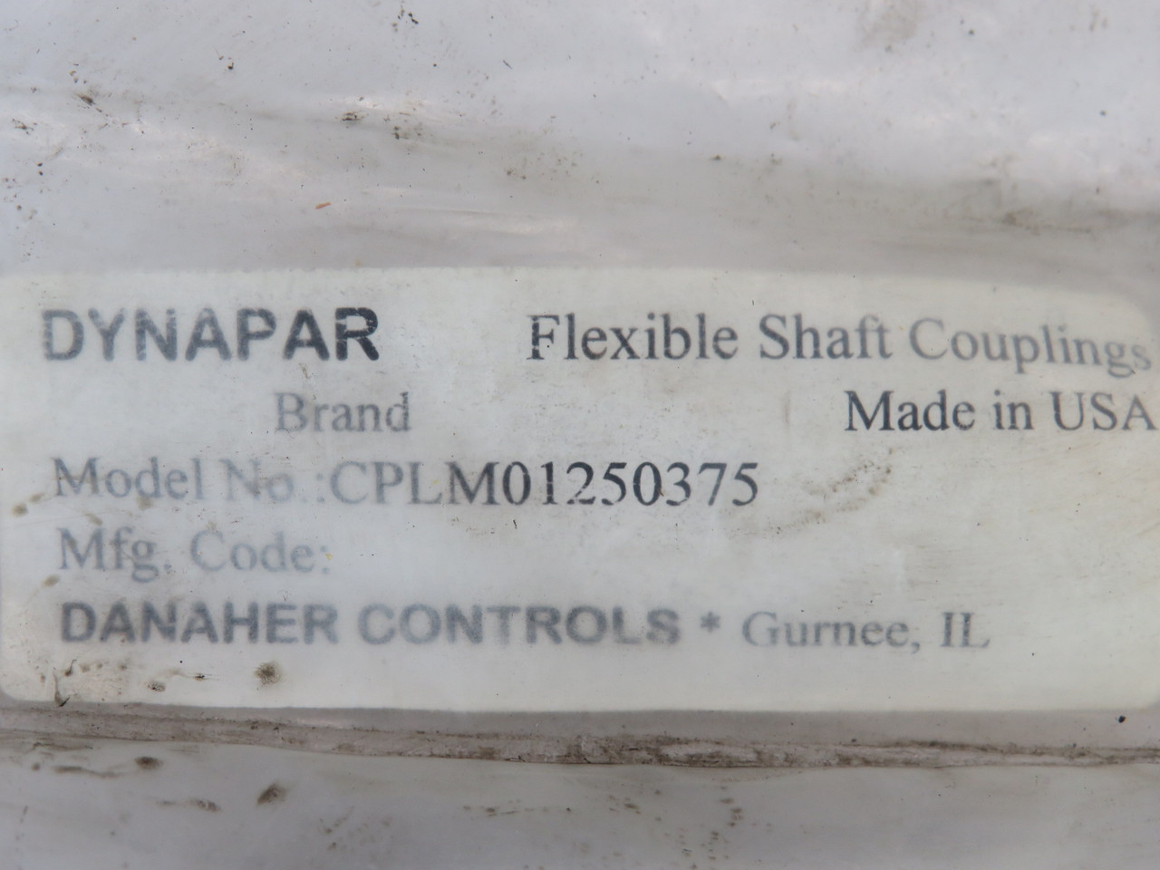 Dynapar CPLM01250375 Flexible Shaft Coupling 3/8"ID 1-1/2"L HOLEY/DIRTY BAG NWB