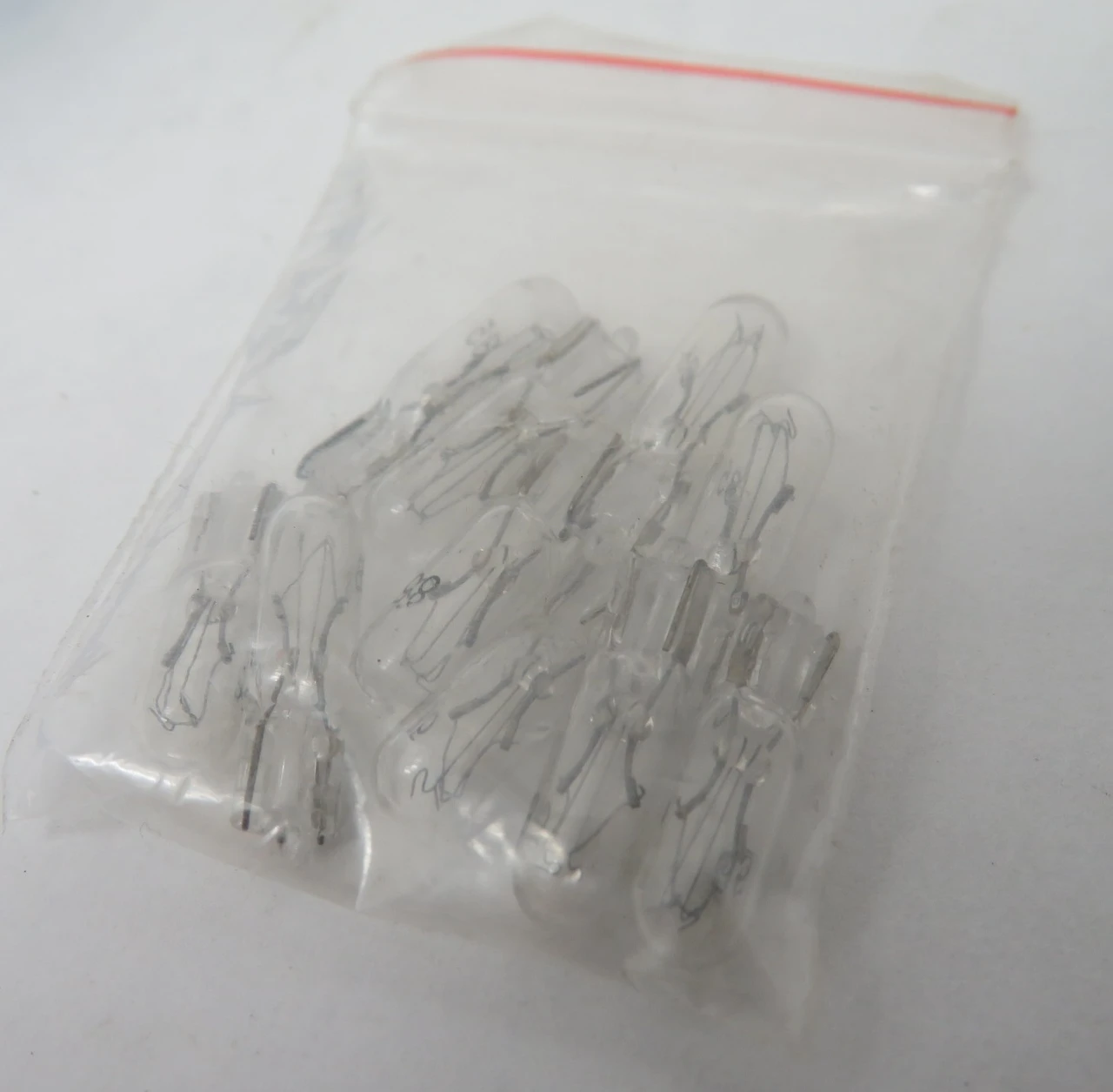 Standard T1.75/CL/28V/0.04A/WDG/STD Miniature Light Bulb 10-Pack BOX DAMAGE NEW