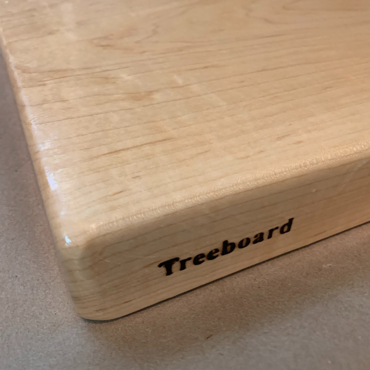 https://cdn11.bigcommerce.com/s-1vey7r6116/images/stencil/1280x1280/products/112/484/medium-maple-cutting-board-by-Treeboard-brand__99263.1669344747.jpg?c=1