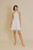 Aureum Halter Neck Smocked Mini Dress / White