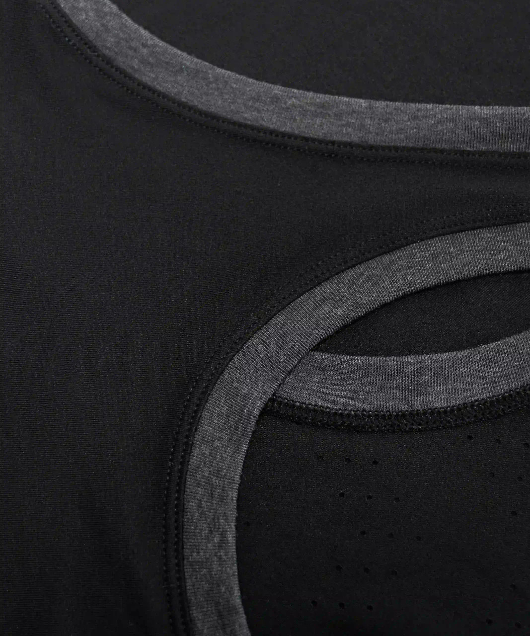 Energize Tank, black racerback performance tank with flat-knit trim, close-up view