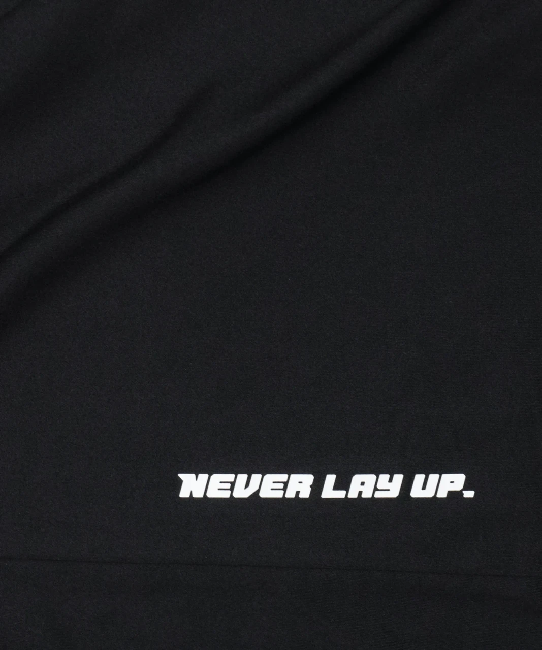 Surge T-Shirt, black performance t-shirt with Bomber chest logo, close-up view