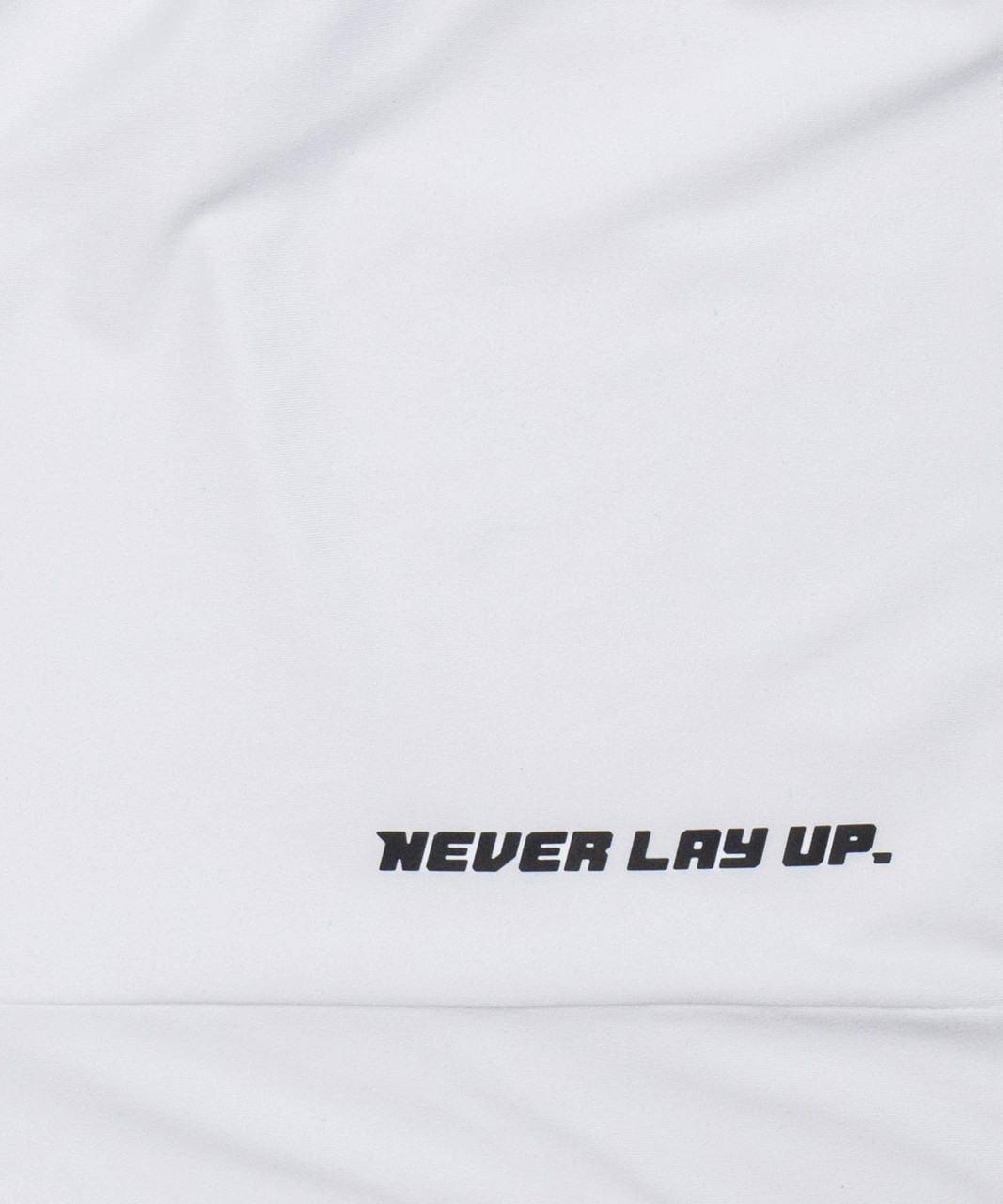 Surge T-Shirt, white performance t-shirt with Bomber chest logo, close-up view