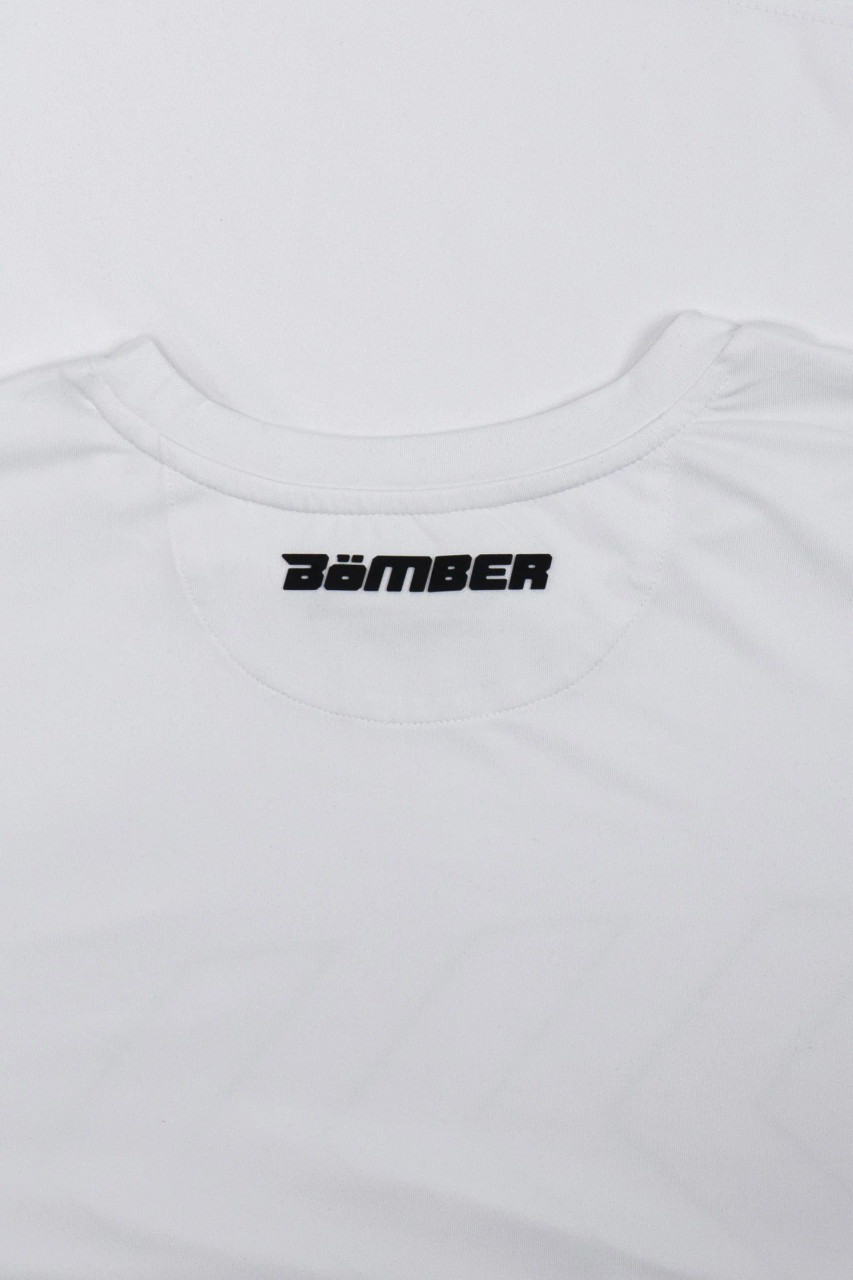 Surge T-Shirt, white performance t-shirt with silicone Bomber back yoke logo, close-up view