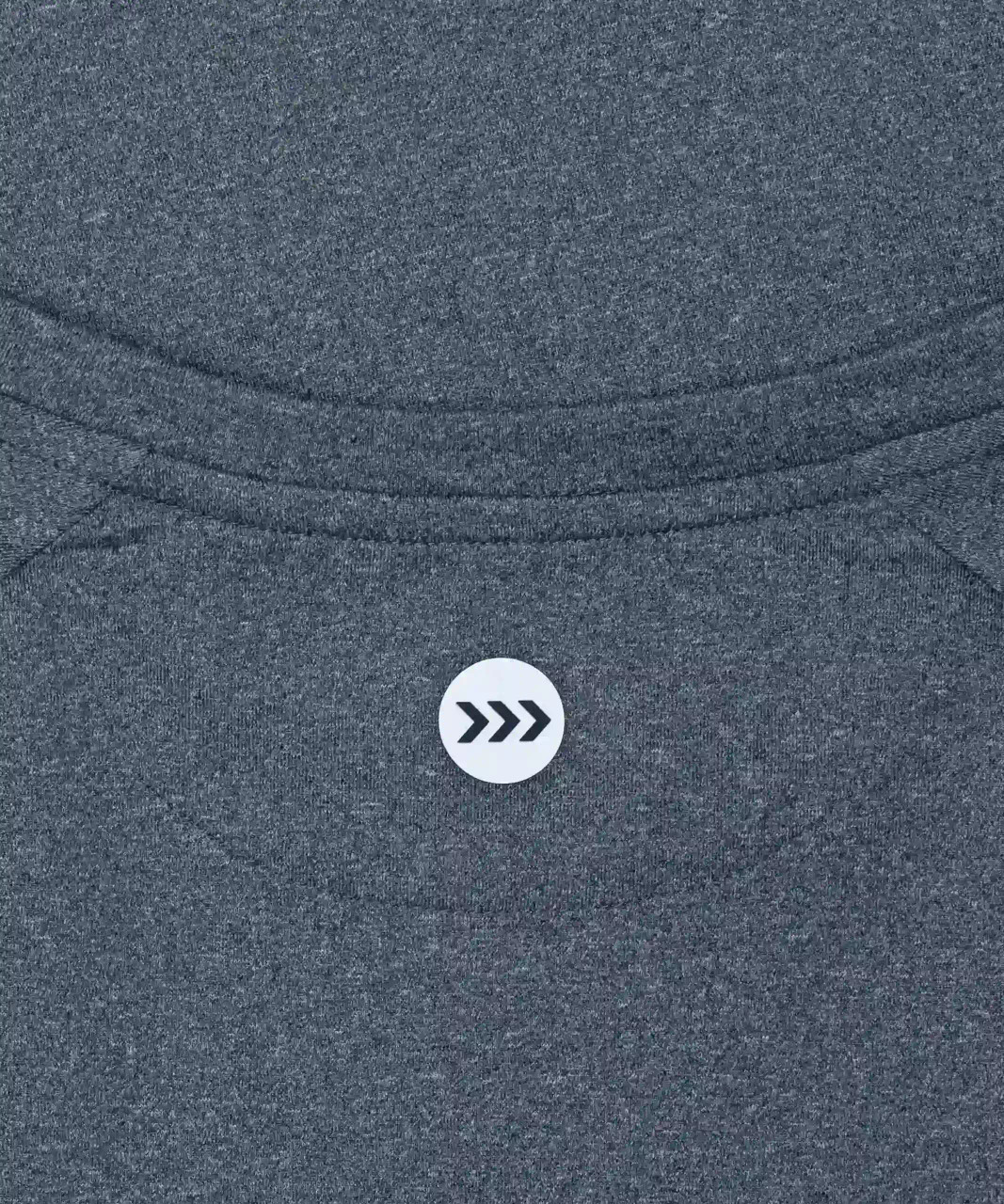 Elevate T-Shirt, navy heather HydrApex performance fabric with silicone Bomber chest logo, close-up view