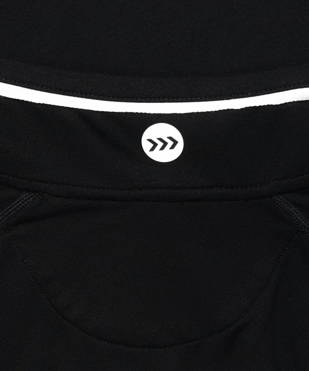 Pinnacle DR Q-Zip, black performance quarter-zip with silicone Bomber hip logo, close-up view