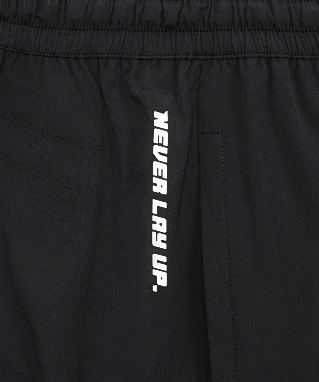 Focus Active Short, black athletic shorts with heat transfer thigh logo, close-up view
