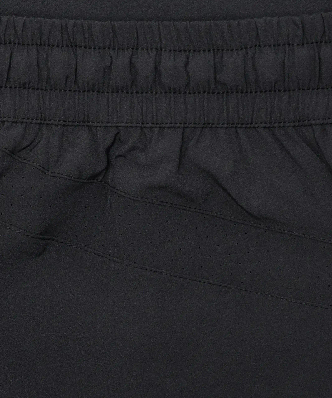 Focus Active Short, black elastic waistband with adjustable drawcord, close-up view