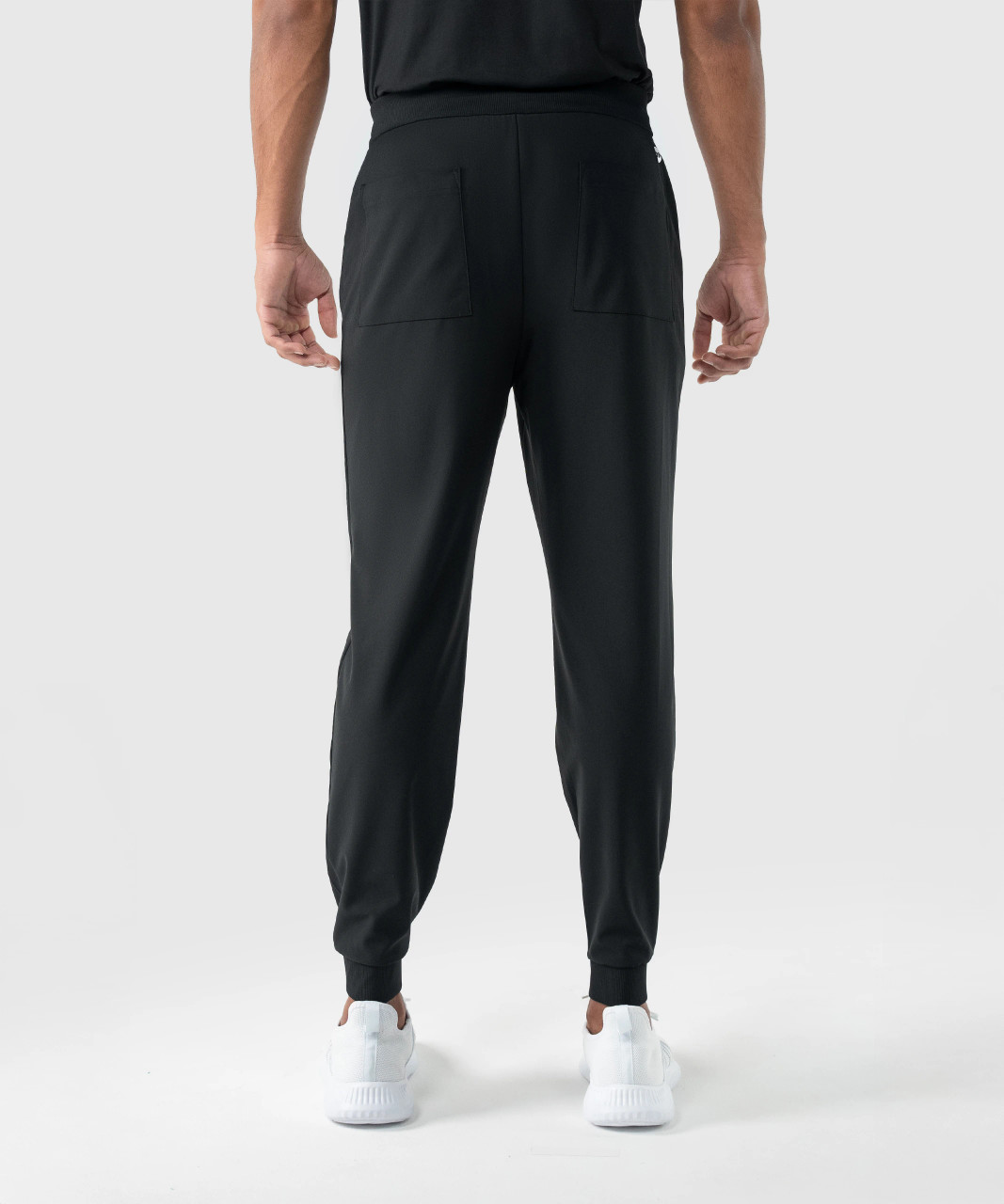Triumph Jogger, men's black water-repellent athletic jogger with zippered back pocket, back view