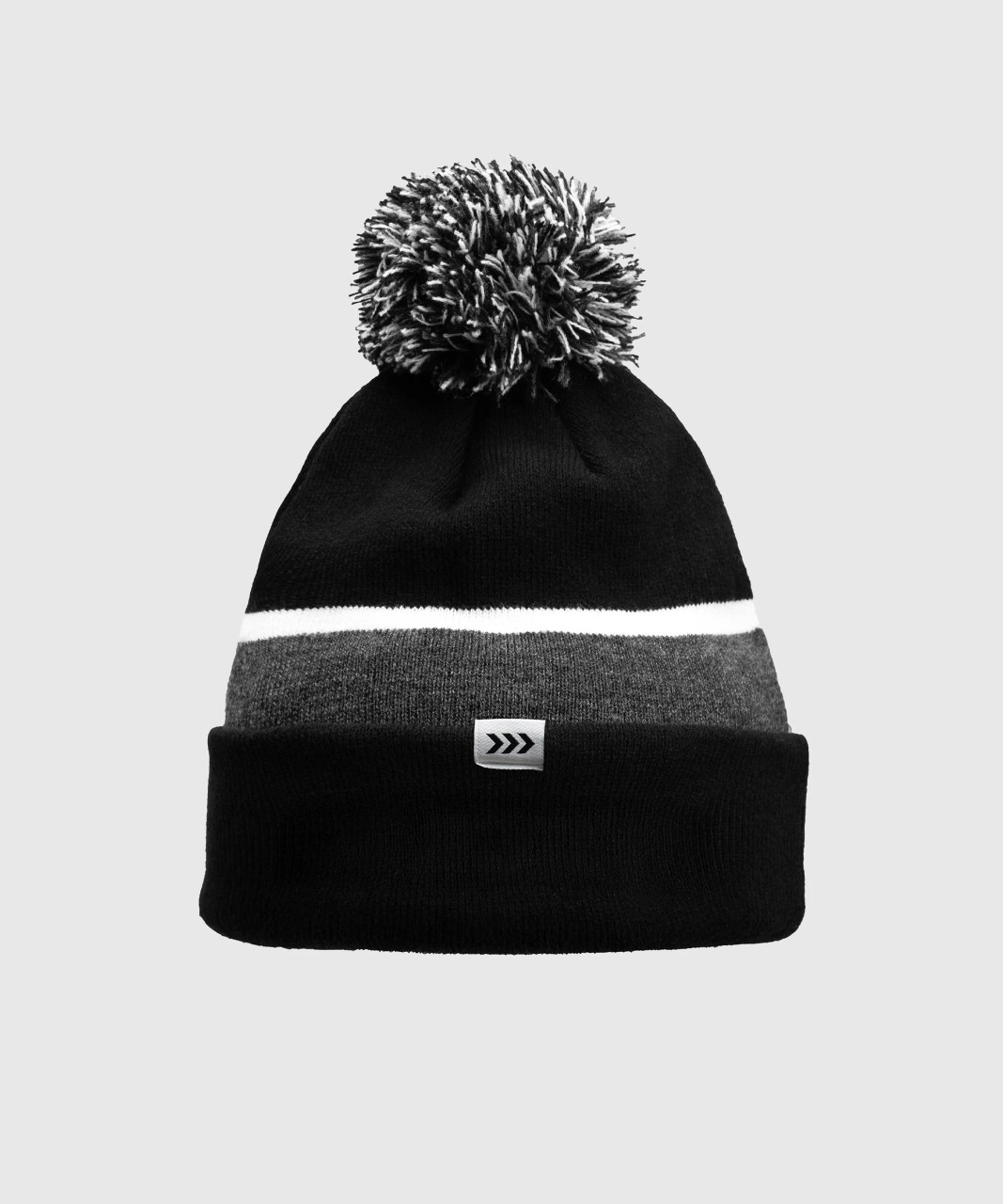 Base Pom Beanie, black rib-knit acrylic beanie with pom and Bomber logo patch, back view