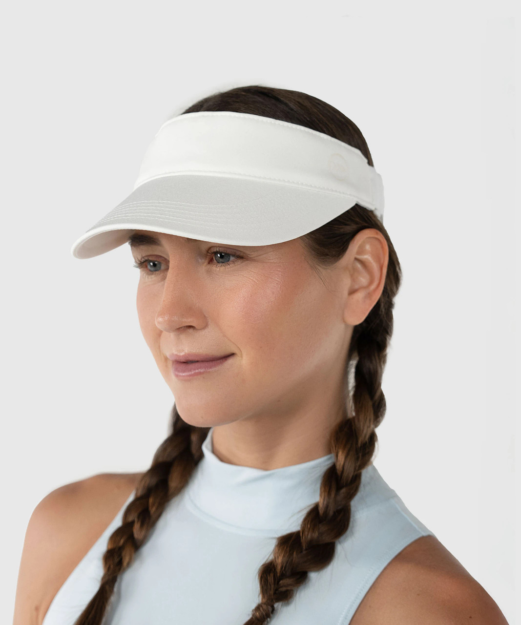 Eclipse Visor, white performance visor worn by woman, front view