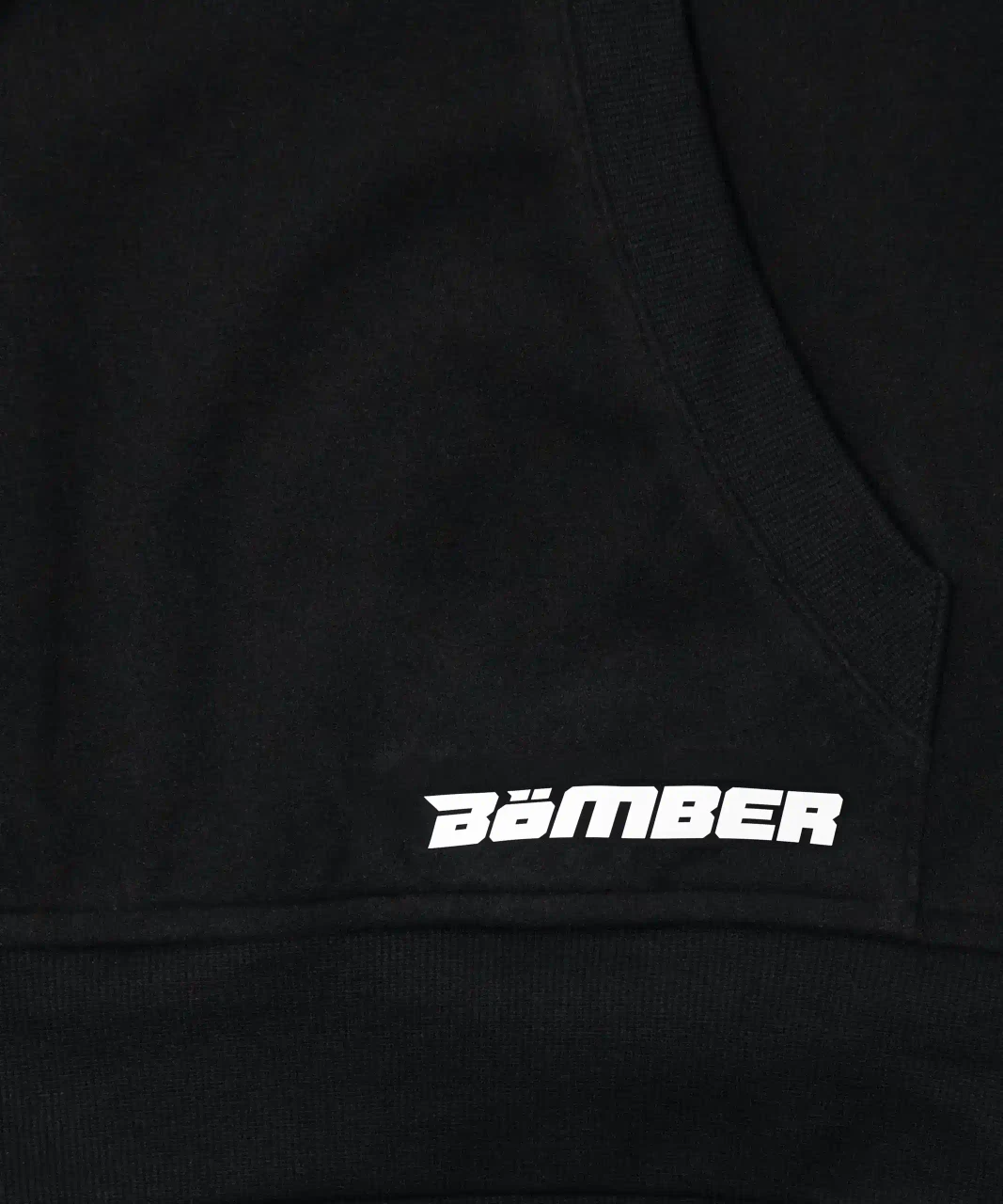 Emerge Hoodie, black hoodie with Bomber graphic wordmark on chest