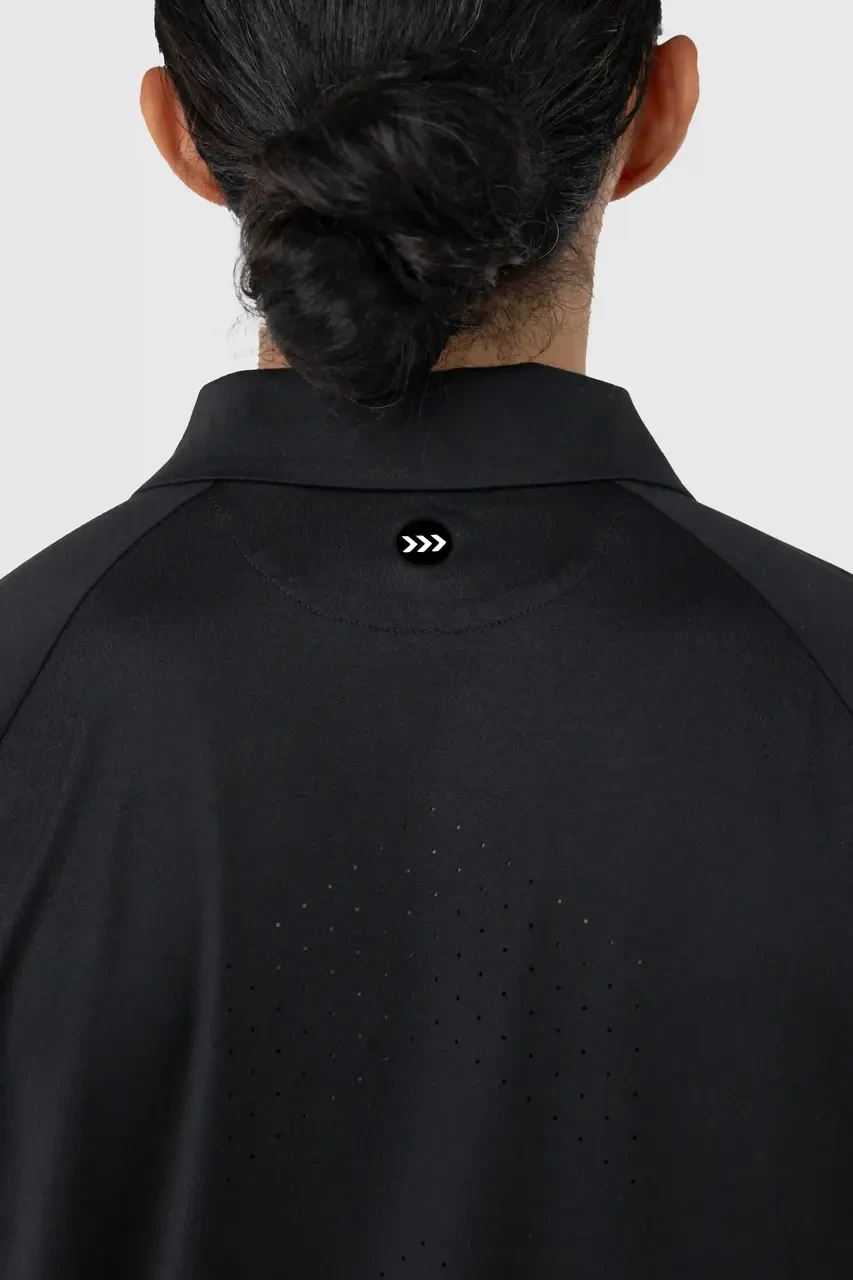 Peak Polo, black performance polo collar and neckline, quick-dry fabric detail