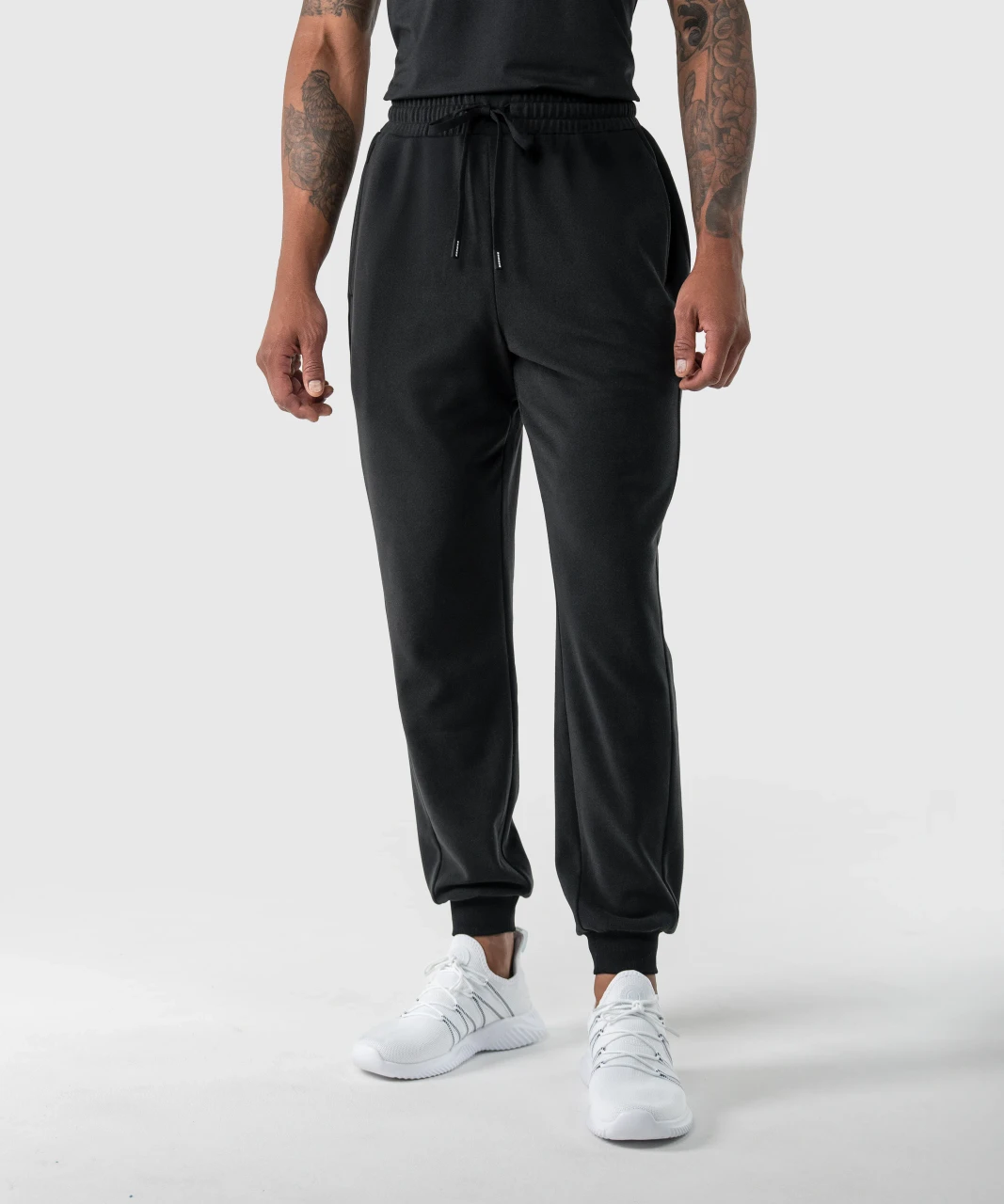 Prime Jogger, men's black brushed fleece jogger with LuxeGo fabric, tapered fit, front view