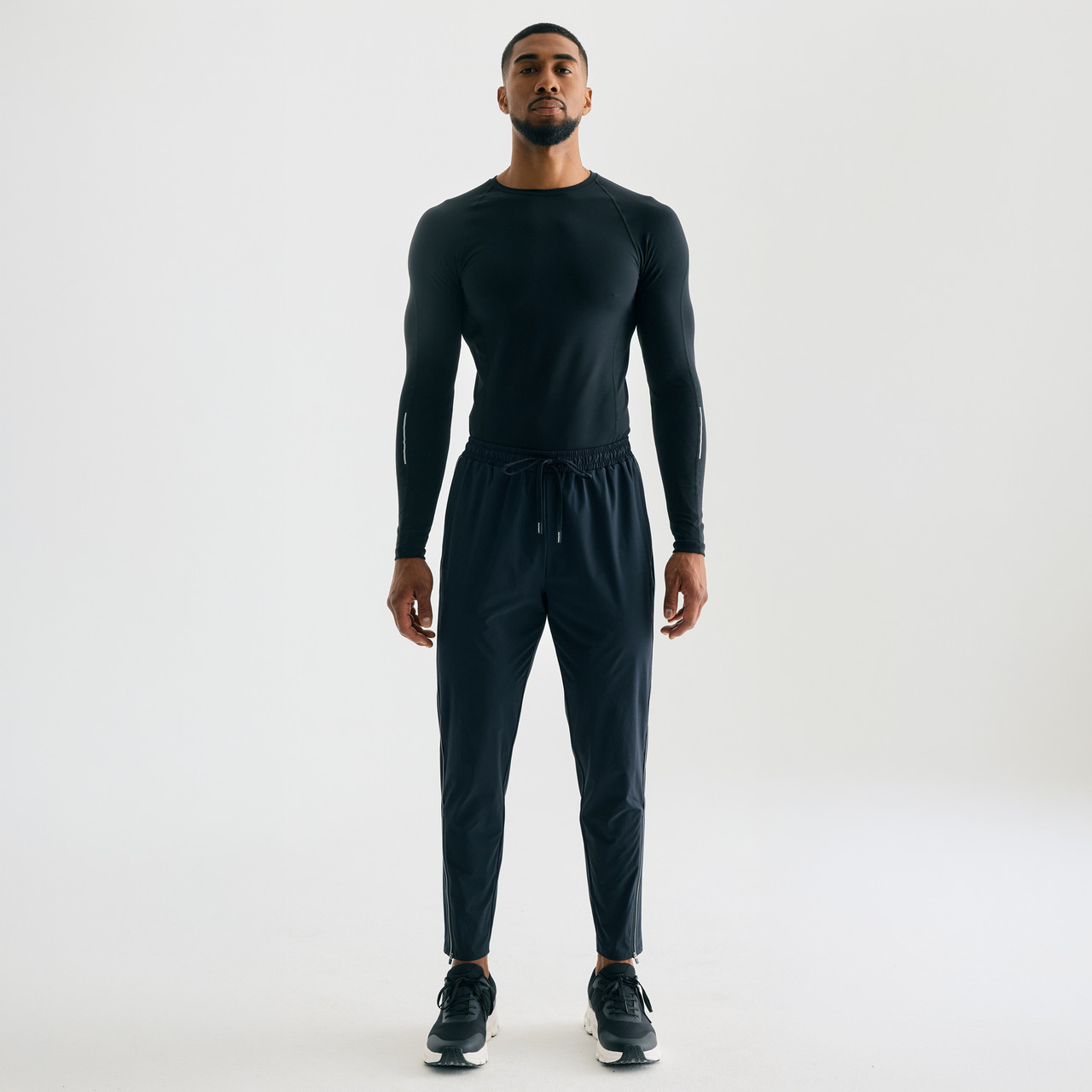 Surpass Pant, men's black jogger pants, standing front view