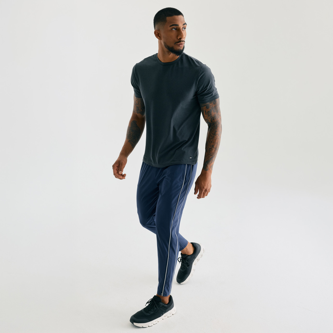 Surpass Pant, men's navy jogger pants, walking action shot